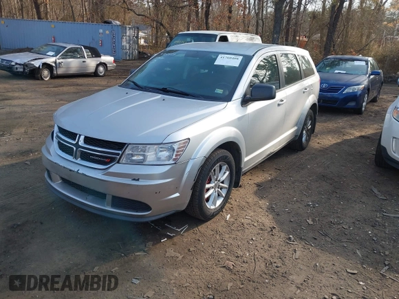2014 Dodge Journey SE with VIN 3C4PDCAB1ET247218, listed as a IAAI auction lot 41760408 with 148,591 mi miles and . Bid and sale history available at carsss.com. Image 2.
