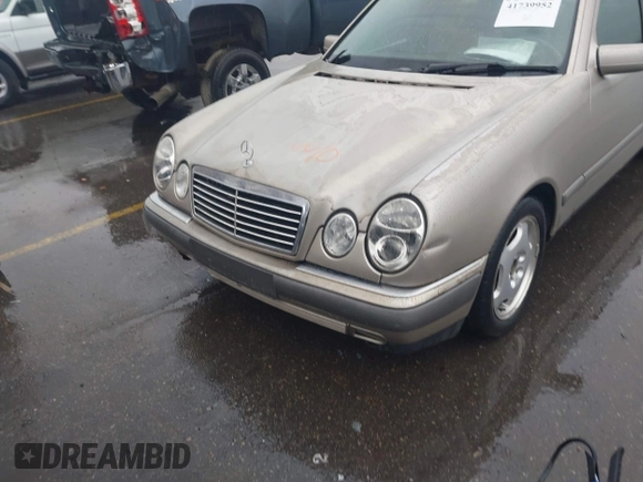 1997 Mercedes-Benz E-Class with VIN WDBJF72F0VA323171, listed as a IAAI auction lot 41739952 with 1 mi miles. Bid and sale history available at carsss.com. Image 6.