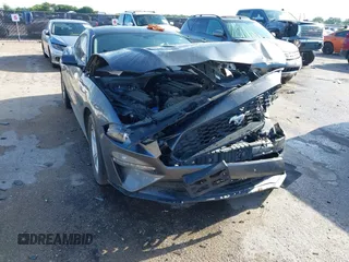 2020 Ford Mustang EcoBoost with VIN 1FA6P8TH3L5169920, listed as a IAAI auction lot 42339107 with 84,748 mi miles and . Bid and sale history available at DreamBid. Image 1.