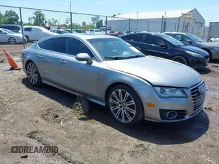 2012 Audi A7 Prestige z VIN WAU2GAFC3CN134940, wystawiony jako IAAI lot #42649389 z przebiegiem 163 450 mil mil oraz . Historia ofert i sprzedaży dostępna na DreamBid. Obrazek 1.