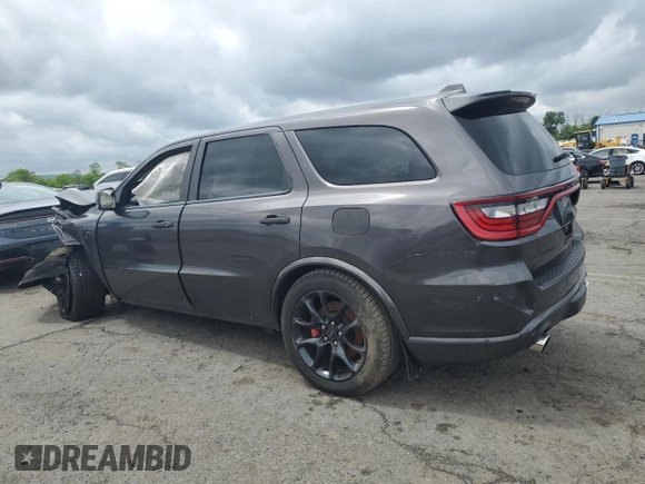 2021 Dodge Durango SRT Hellcat with VIN 1C4SDJH90MC845182, listed as a Copart auction lot 58799525 with Not provided miles and Salvage title. Bid and sale history available at DreamBid. Image 2.