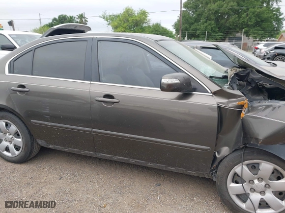 2009 Kia Optima LX with VIN KNAGE228X95299444, listed as a IAAI auction lot 41953241 with 201,170 mi miles. Bid and sale history available at carsss.com. Image 14.