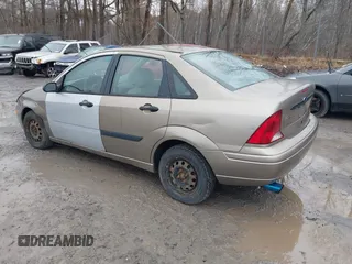 2003 Ford Focus LX with VIN 1FAFP33P33W267575, listed as a IAAI auction lot 41804406 with 106,957 mi miles and . Bid and sale history available at carsss.com. Image 3.