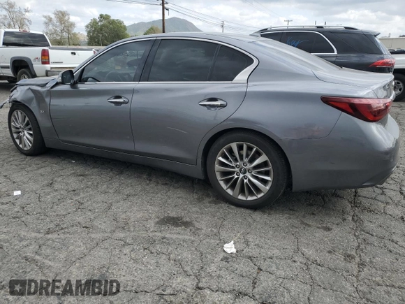 2019 Infiniti Q50 Luxe z VIN JN1EV7AP6KM513800, wystawiony jako Copart lot #51117555 z przebiegiem 92 337 mil mil oraz Szkody całkowita. Historia ofert i sprzedaży dostępna na DreamBid. Obrazek 2.