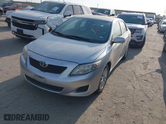 2009 Toyota Corolla with VIN 1NXBU40E59Z078727, listed as a IAAI auction lot 42035739 with 113,814 mi miles. Bid and sale history available at carsss.com. Image 2.