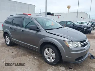 2013 Dodge Journey American Value with VIN 3C4PDCAB3DT563492, listed as a IAAI auction lot 42598218 with 77,650 mi miles and . Bid and sale history available at DreamBid. Image 1.