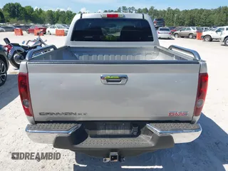 2012 GMC Canyon z VIN 1GCD5MFE3C8107823, wystawiony jako IAAI lot #42146540 z przebiegiem 100 063 mil mil oraz . Historia ofert i sprzedaży dostępna na DreamBid. Obrazek 17.