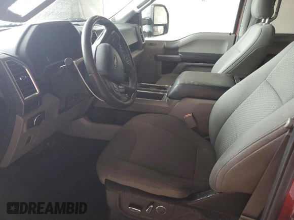 2016 Ford F-150 XLT with VIN 1FTEW1EG2GKF93746, listed as a Copart auction lot 57030625 with 124,989 mi miles and Salvage title. Bid and sale history available at DreamBid. Image 7.