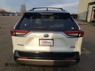 2020 Toyota RAV4 Hybrid XSE with VIN JTMEWRFV5LD541943, listed as a Copart auction lot 84005364 with 88,435 mi miles and Salvage title. Bid and sale history available at DreamBid. Image 6.