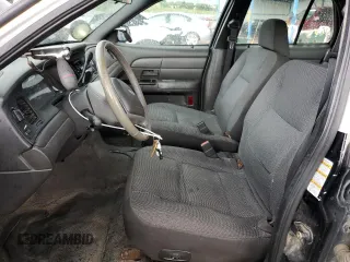 2004 Ford Police Interceptor with VIN 2FAHP71W14X138220, listed as a Copart auction lot 59930385 with 169,302 mi miles and Salvage title. Bid and sale history available at DreamBid. Image 7.