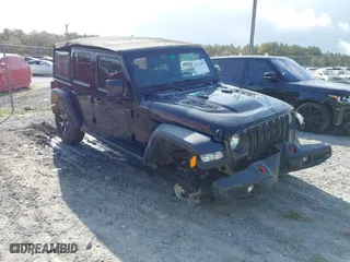 2021 Jeep Wrangler Unlimited Rubicon with VIN 1C4HJXFN0MW713057, listed as a IAAI auction lot 41773485 with 52,480 mi miles. Bid and sale history available at carsss.com. Image 1.