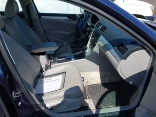 2013 Volkswagen Passat SE w/Sunroof & Nav with VIN 1VWBP7A30DC074235, listed as a IAAI auction lot 41967875 with 153,803 mi miles. Bid and sale history available at carsss.com. Image 5.