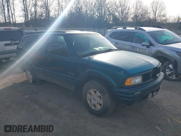 1997 Oldsmobile Bravada z VIN 1GHDT13W9V2705528, wystawiony jako IAAI lot #41583837 z przebiegiem 284 281 mil mil oraz . Historia ofert i sprzedaży dostępna na DreamBid. Obrazek 1.