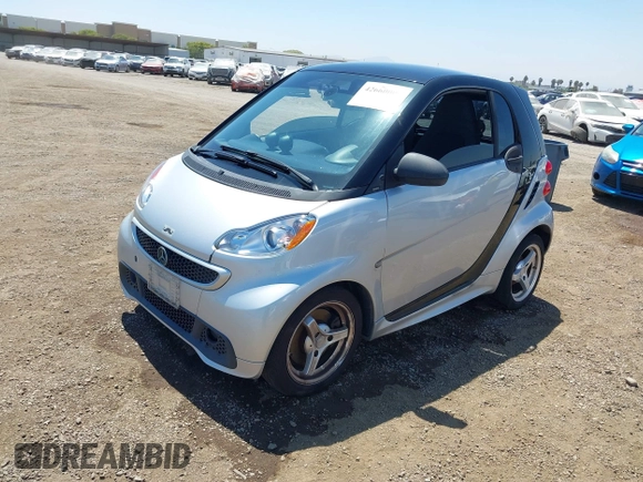 2013 Smart fortwo Pure with VIN WMEEJ3BA8DK619600, listed as a IAAI auction lot 42660006 with Not provided miles and . Bid and sale history available at DreamBid. Image 2.