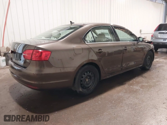 2014 Volkswagen Jetta TDI w/Premium with VIN 3VWLL7AJ1EM358214, listed as a IAAI auction lot 42148435 with 174,923 mi miles and . Bid and sale history available at DreamBid. Image 4.