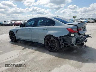2023 BMW M3 Competition xDrive with VIN WBS43AY00PFN57168, listed as a Copart auction lot 50732415 with 28,453 mi miles and Salvage title. Bid and sale history available at DreamBid. Image 2.