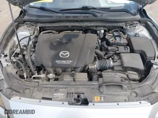 2018 Mazda Mazda3 4-Door Touring with VIN 3MZBN1V37JM262418, listed as a IAAI auction lot 41880212 with 118,662 mi miles. Bid and sale history available at carsss.com. Image 10.