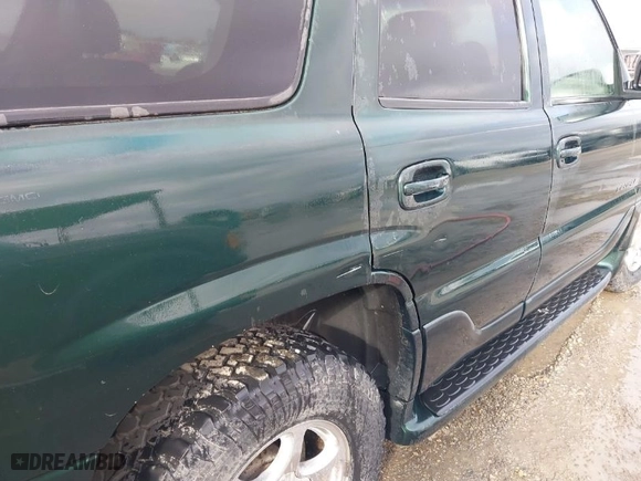 2003 GMC Yukon Denali with VIN 1GKEK63U13J206304, listed as a IAAI auction lot 41703536 with 224,781 mi miles. Bid and sale history available at carsss.com. Image 6.