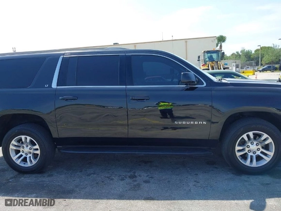 2018 Chevrolet Suburban LT with VIN 1GNSCHKC7JR111560, listed as a IAAI auction lot 41823175 with 136,751 mi miles. Bid and sale history available at carsss.com. Image 13.