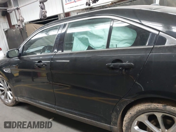 2015 Ford Taurus Limited with VIN 1FAHP2J83FG152343, listed as a IAAI auction lot 41507478 with 97,648 mi miles. Bid and sale history available at carsss.com. Image 14.