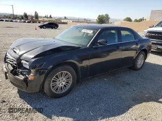 2009 Chrysler 300 LX with VIN 2C3KA43D59H529761, listed as a Copart auction lot 44260275 with 135,802 mi miles and Salvage Title. Bid and sale history available at carsss.com. Image 1.