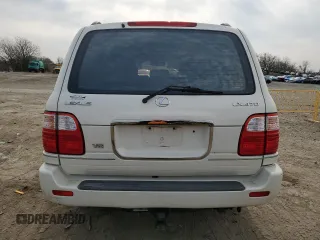 2000 Lexus LX 470 z VIN JT6HT00W8Y0126253, wystawiony jako Copart lot #49400665 z przebiegiem 181 328 mil mil oraz Szkody całkowita. Historia ofert i sprzedaży dostępna na DreamBid. Obrazek 6.