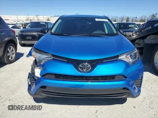 2017 Toyota RAV4 LE with VIN 2T3BFREV2HW695542, listed as a Copart auction lot 48285145 with 133,793 mi miles and Salvage Title. Bid and sale history available at DreamBid. Image 5.