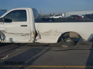 2018 Ram 1500 Tradesman with VIN 3C6JR6DG6JG157833, listed as a IAAI auction lot 41794118 with 205,186 mi miles and . Bid and sale history available at DreamBid. Image 6.