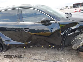 2022 Mazda CX-9 Touring Plus z VIN JM3TCBAYXN0613830, wystawiony jako IAAI lot #41942849 z przebiegiem 50 193 mil mil oraz . Historia ofert i sprzedaży dostępna na DreamBid. Obrazek 14.