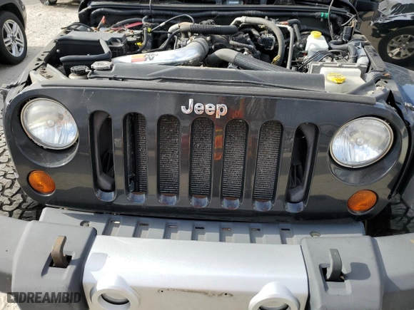2011 Jeep Wrangler Unlimited Sahara with VIN 1J4HA5H19BL623123, listed as a Copart auction lot 72860734 with 0 mi miles and Non Repairable. Bid and sale history available at carsss.com. Image 11.