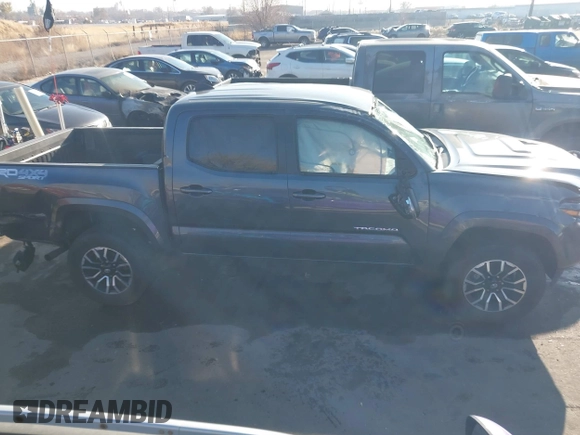 2023 Toyota Tacoma SR with VIN 3TMCZ5AN2PM553928, listed as a IAAI auction lot 40999044 with 9,210 mi miles and . Bid and sale history available at DreamBid. Image 13.