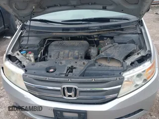 2012 Honda Odyssey EX-L with VIN 5FNRL5H66CB081323, listed as a IAAI auction lot 42465110 with 266,934 mi miles and . Bid and sale history available at DreamBid. Image 10.
