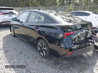 2021 Toyota Prius L Eco with VIN JTDKAMFU8M3136565, listed as a IAAI auction lot 42161896 with 39,634 mi miles and . Bid and sale history available at DreamBid. Image 3.