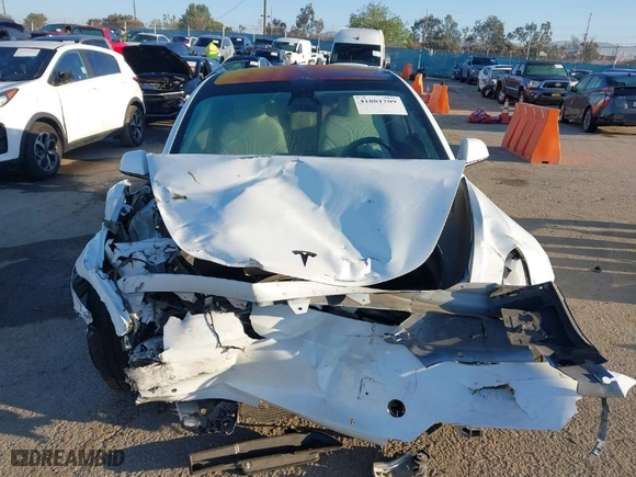 2018 Tesla Model 3 Long Range Battery with VIN 5YJ3E1EB0JF092440, listed as a IAAI auction lot 41881209 with 74,818 mi miles. Bid and sale history available at carsss.com. Image 12.