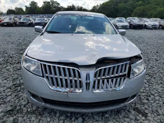 2012 Lincoln MKZ z VIN 3LNHL2GC4CR804632, wystawiony jako Copart lot #55783535 z przebiegiem 148 036 mil mil oraz Szkoda całkowita • Salvage title. Historia ofert i sprzedaży dostępna na DreamBid. Obrazek 5.
