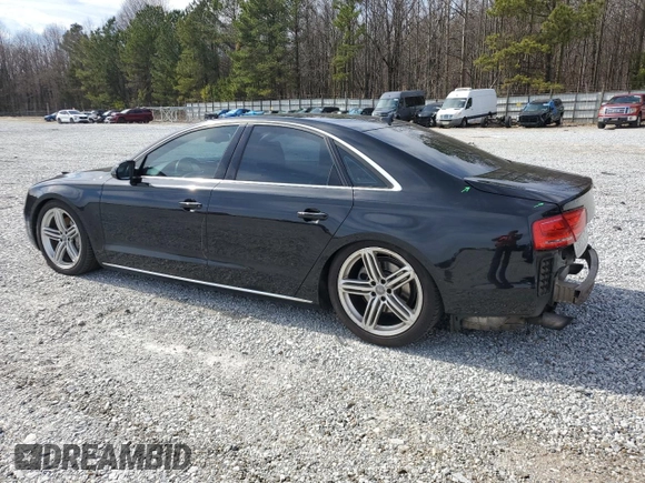 2013 Audi A8 3.0L с VIN WAUAGAFDXDN003929, выставлен на аукционе Copart как лот 44928465 с пробегом 186 921 миль миль и Списание • Salvage title. История ставок и продаж доступна на DreamBid. Изображение 2.