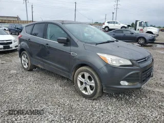 2016 Ford Escape SE z VIN 1FMCU9G97GUB40023, wystawiony jako Copart lot #61405935 z przebiegiem 107 591 mil mil oraz Czysty tytuł • Clean title. Historia ofert i sprzedaży dostępna na DreamBid. Obrazek 4.