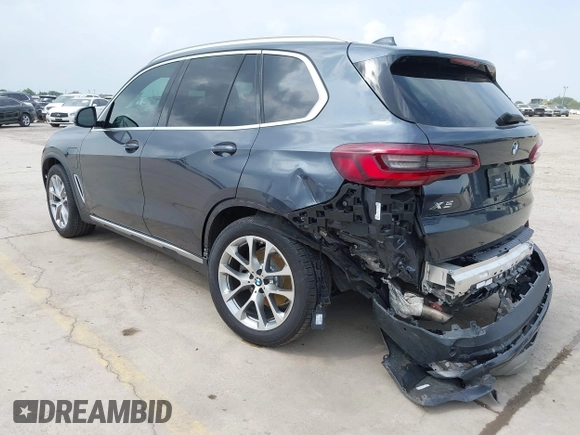2021 BMW X5 xDrive45e with VIN 5UXTA6C04M9D34382, listed as a IAAI auction lot 42080996 with 24,638 mi miles and . Bid and sale history available at DreamBid. Image 3.