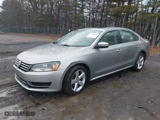 2012 Volkswagen Passat SE w/Sunroof with VIN 1VWBH7A39CC108345, listed as a IAAI auction lot 41582865 with 168,741 mi miles. Bid and sale history available at carsss.com. Image 2.