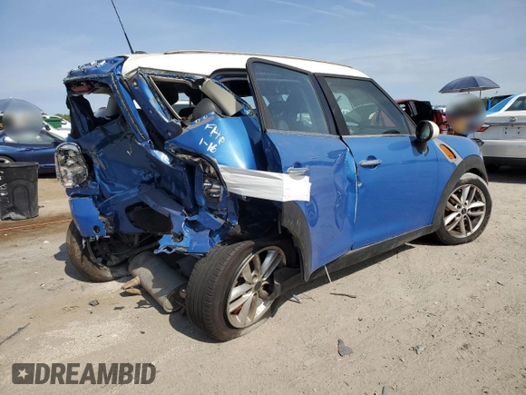 2012 MINI Countryman with VIN WMWZB3C57CWM06544, listed as a Copart auction lot 55838805 with 150,048 mi miles and Salvage Title. Bid and sale history available at DreamBid. Image 3.