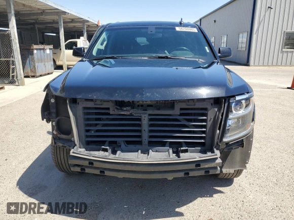 2017 Chevrolet Tahoe LS with VIN 1GNSCAEC4HR248971, listed as a Copart auction lot 58266665 with 94,377 mi miles and Salvage title. Bid and sale history available at DreamBid. Image 5.