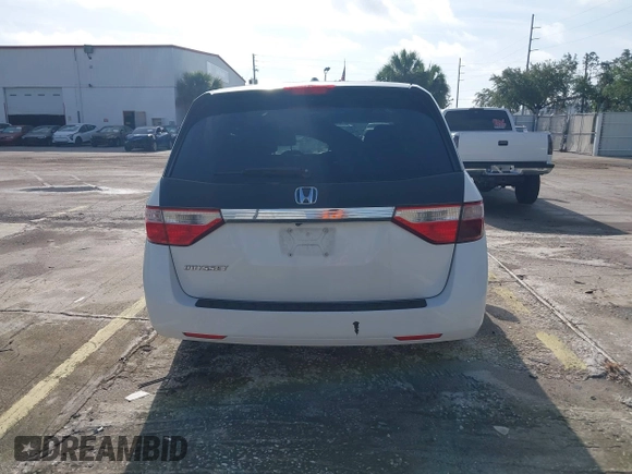2012 Honda Odyssey EX-L z VIN 5FNRL5H61CB032353, wystawiony jako IAAI lot #42471691 z przebiegiem 186 257 mil mil oraz . Historia ofert i sprzedaży dostępna na DreamBid. Obrazek 16.