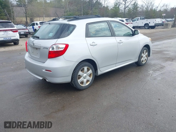 2009 Toyota Matrix with VIN 2T1KU40E99C006768, listed as a IAAI auction lot 42125813 with 163,832 mi miles. Bid and sale history available at carsss.com. Image 4.