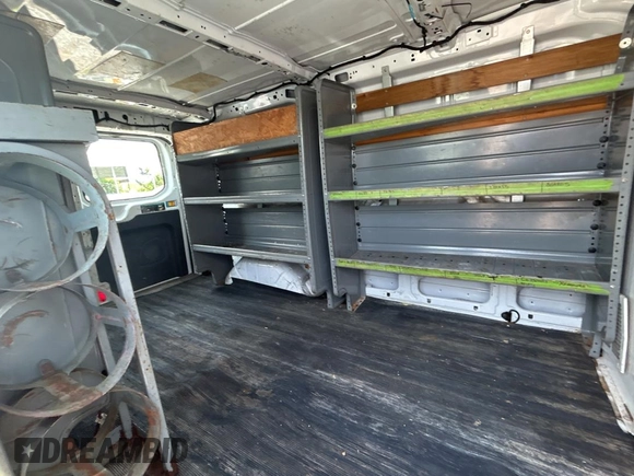 2015 Ford Transit Cargo with VIN 1FTNR1ZM6FKA47229, listed as a Copart auction lot 61978315 with 227,678 mi miles and Clean title. Bid and sale history available at DreamBid. Image 6.