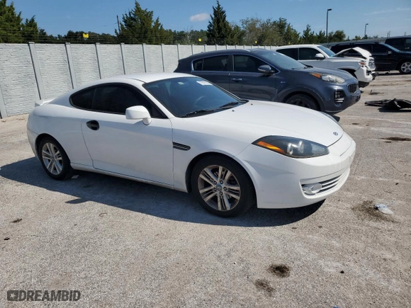 2007 Hyundai Tiburon GS with VIN KMHHM66D67U248918, listed as a Copart auction lot 77618184 with 145,703 mi miles and Salvage Title. Bid and sale history available at carsss.com. Image 4.