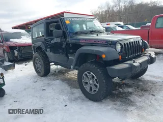2013 Jeep Wrangler Rubicon 10th Anniversary with VIN 1C4BJWCG3DL591186, listed as a IAAI auction lot 41315969 with 54,984 mi miles and . Bid and sale history available at carsss.com. Image 1.