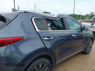 2019 Kia Sportage EX with VIN KNDPN3AC3K7569882, listed as a IAAI auction lot 42094311 with 67,816 mi miles and . Bid and sale history available at DreamBid. Image 6.