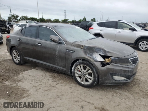 2011 Kia Optima EX with VIN KNAGN4A65B5139487, listed as a Copart auction lot 76731764 with Not Provided miles and Salvage Title. Bid and sale history available at carsss.com. Image 4.