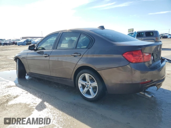 2015 BMW 3 Series 328i with VIN WBA3A5G58FNS88853, listed as a Copart auction lot 42785375 with 129,918 mi miles and Salvage title. Bid and sale history available at DreamBid. Image 2.