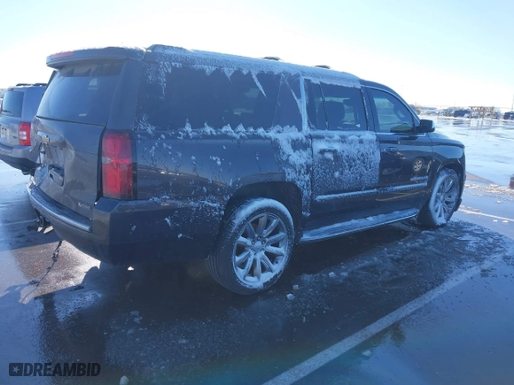 2017 Chevrolet Suburban Premier with VIN 1GNSKJKC0HR274605, listed as a IAAI auction lot 41828392 with 144,747 mi miles. Bid and sale history available at carsss.com. Image 4.